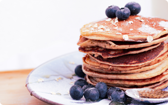 A palte of delicious blueberry pancakes